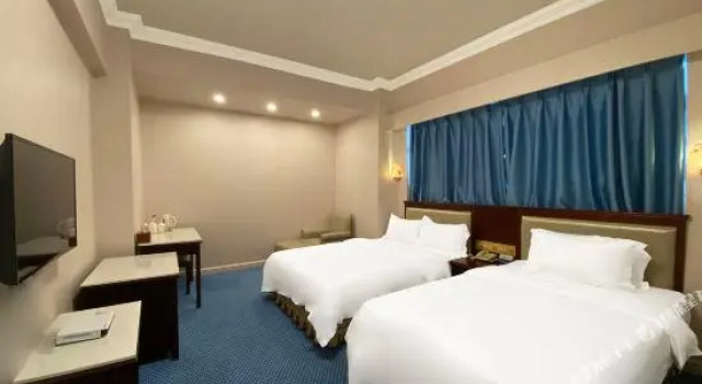 Xinhaorun Holiday Hotel Haotong Building (Zhuhai Gongbei Port)