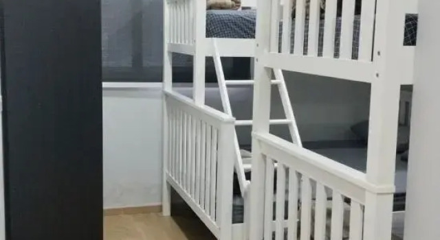 Кровать в общем номере Guanhu Holiday Hotel