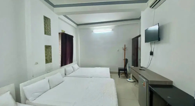 Кровать в общем номере Hotel Caravelle Can Tho 1