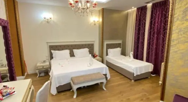 Habitación triple De lujo The Red Bricks Hotel