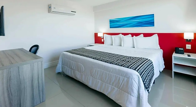 Четырёхместный номер Luxury Ramada Hotel & Suites Campos Dos Goytacazes