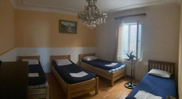 Кровать в общем номере Ortachala Summer House