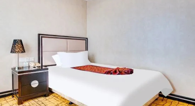 Семейный люкс с 2 комнатами Tianjiao Hotel