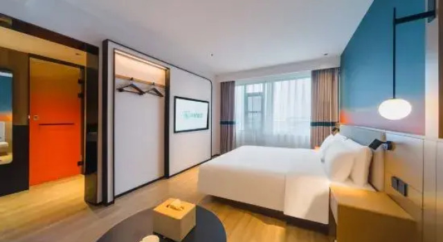 Люкс с 2 комнатами Ni Hao Hotel (Xinyang Chuwangcheng Nanjing Avenue West Section)