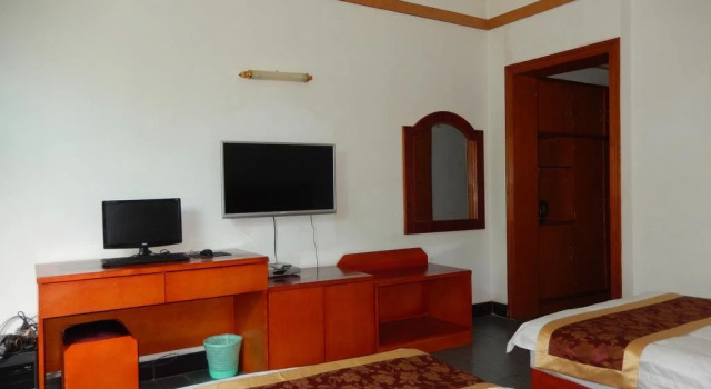 Xishuangbanna Jingyong  Hotel, Забронировать Отель Цзинхун Сишуанбаньна