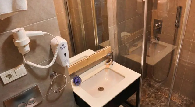 Четырёхместный номер Deluxe Cumbali Plaza Hotel