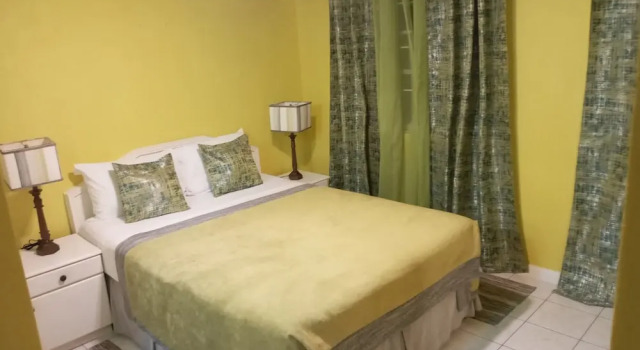 Апартаменты Deluxe c 1 комнатой с балконом Cumber's Tropical Apartments