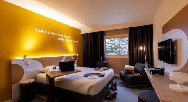 Кровать в общем номере ibis Styles Beauvais