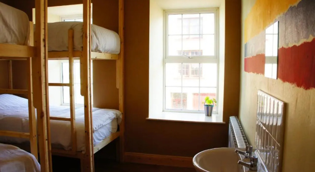 Кровать в общем номере The Black Sheep Hostel