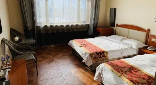 Guanxia Business Hotel, Varaa Hotelli Harbin Heilongjiang