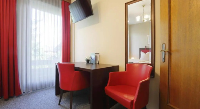 Двухместный номер Standard с балконом Alpen.Adria.Stadthotel