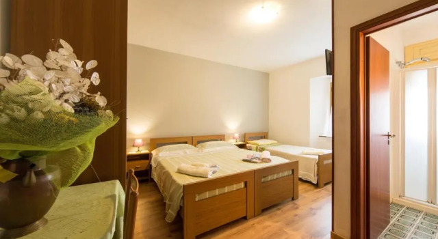 Четырёхместный номер Standard Albergo Ristorante Poli