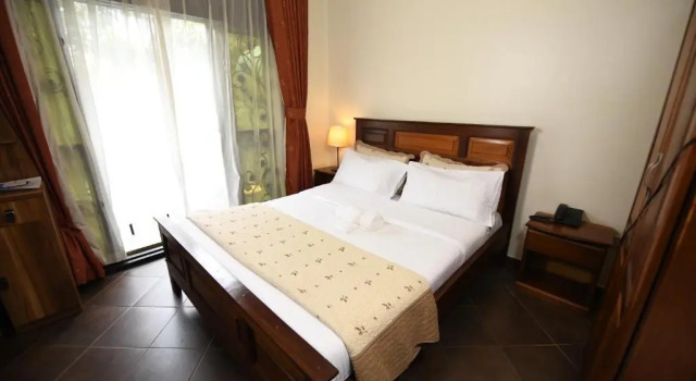 Executivo Casal quarto varanda Biyem Hotel
