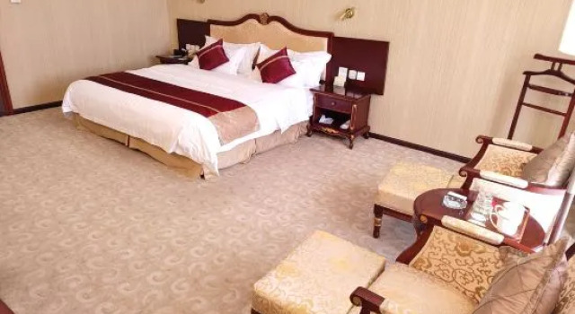 Номер Deluxe Mangshi Hotel