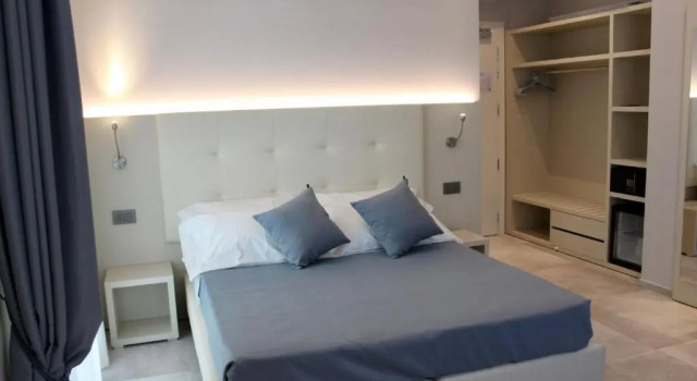 Четырёхместный номер Comfort B&B Primrose Residence Hotel
