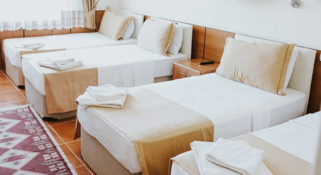 Четырёхместный семейный номер Standard с балконом Kervansaray Hotel