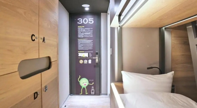 Кровать в общем номере KIWI SHARE HOTEL ZHONGLI
