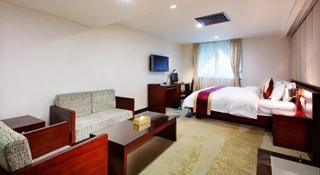 Двухместный люкс Deluxe New World Hotel