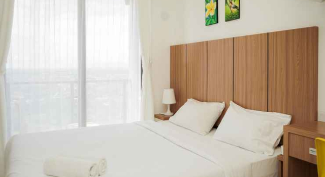 Well Appointed and Homey Studio Room at Sky House BSD Apartment By Travelio