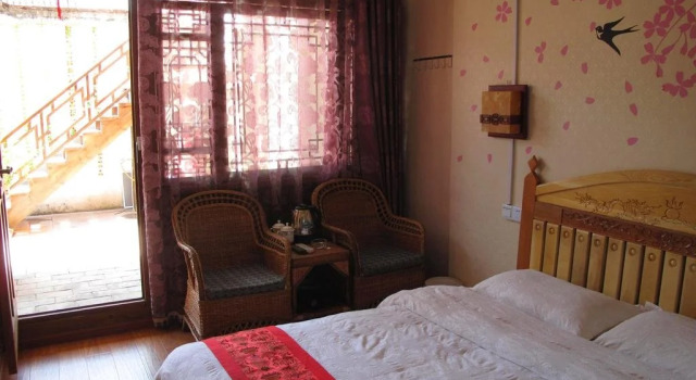 Xinyueju Inn, Забронировать Отель Лицзян Юньнань, рядом с Улица Сквер-стрит Древнего города Даянь