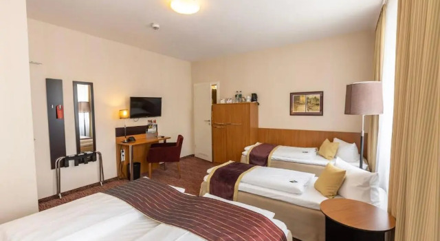 Четырёхместный номер Comfort Hotel tom Kyle