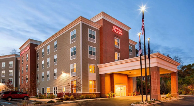 Кровать в общем номере Hampton Inn & Suites Exeter