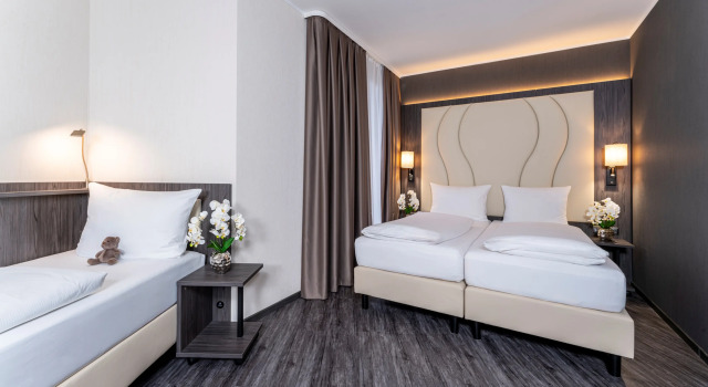 Трёхместный номер Standard PLAZA Premium Parkhotel Norderstedt