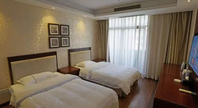 Трёхместный семейный люкс Chongqing Yudu Garden Hotel (West Railway Station Baguocheng Branch)