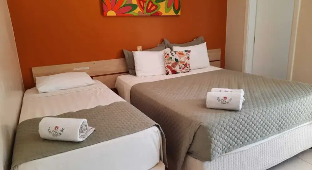 Номер Standard Hotel Rosa da Ilha Guaruja - 80m do mar, 02 piscinas, sala de jogos, brinquedão de percurso para crianças