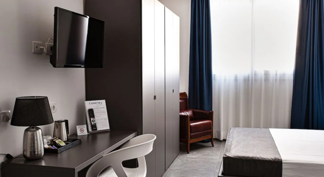 Четырёхместный семейный номер Standard LEssenza Hotel