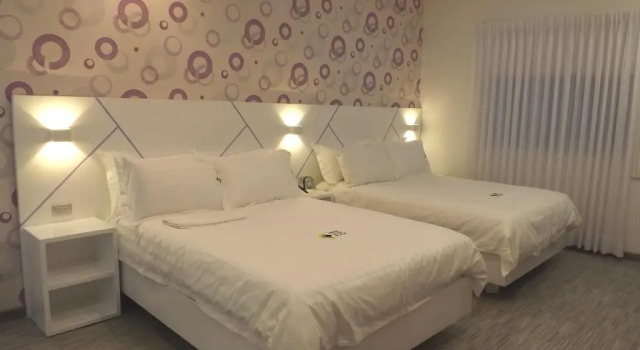 Четырёхместный номер Standard Luma Plaza Hotel