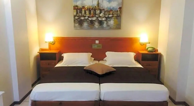 Кровать в общем номере Coudour Boutique Hotel