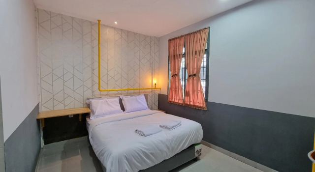 OYO 90874 Millenium Inn 2, Rezerwuj Hotel Medan Sumatra