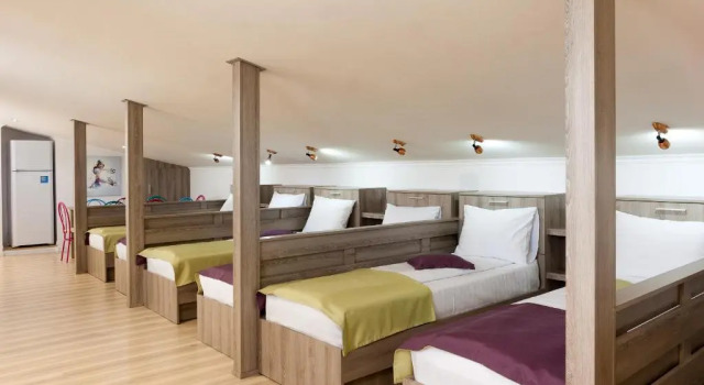 Кровать в общем номере Seva Hotel Health Club