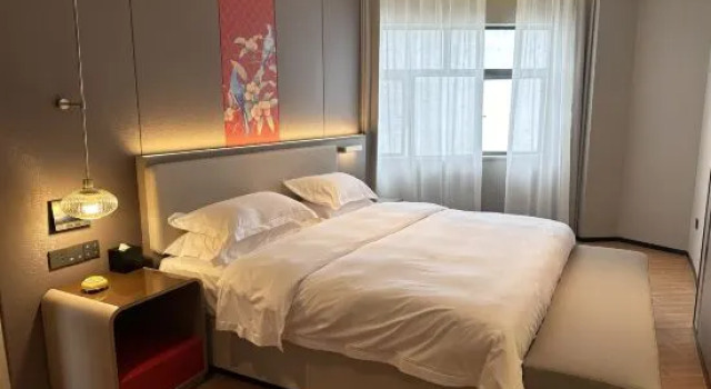 Люкс Deluxe ECHENG Hotel Anshun West Railway Station