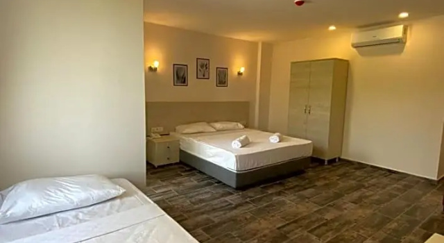 Четырёхместный номер Standard с видом на сад Dream Town Hotel