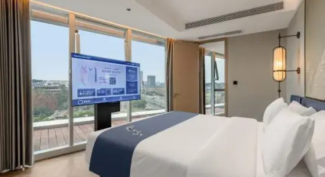Четырёхместный люкс Executive с 2 комнатами с видом на улицу Jianguo Palace Hotel