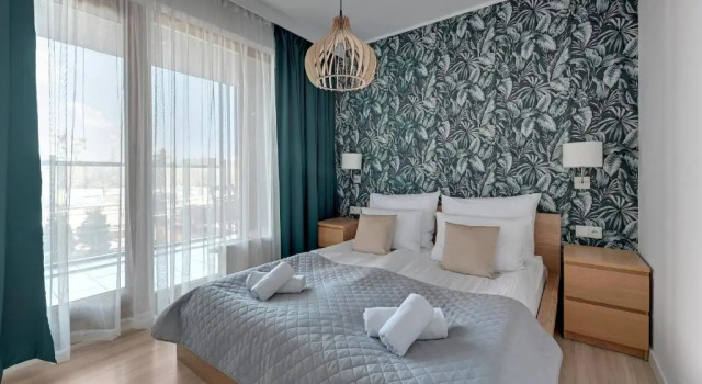 Deluxe Apartment mit Balkon und mit Flussblick Apartamenty Apartinfo Aura