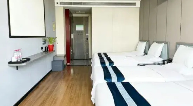 Кровать в общем номере Zhangye Yushuiyuan Hotel.  Lushuiwan Resort Ganzhou Fucheng Store.