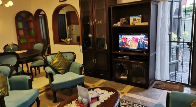 Апартаменты Luxury R&G Justlikehome Apartment 1 with blue sofa set and Apartment 2 with Garden View with brown sofa set