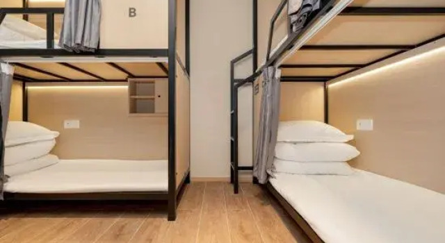 Кровать в общем номере JiTing Esports Hotel