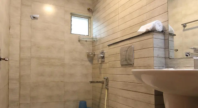 Номер Deluxe Puthens Capitol Inn