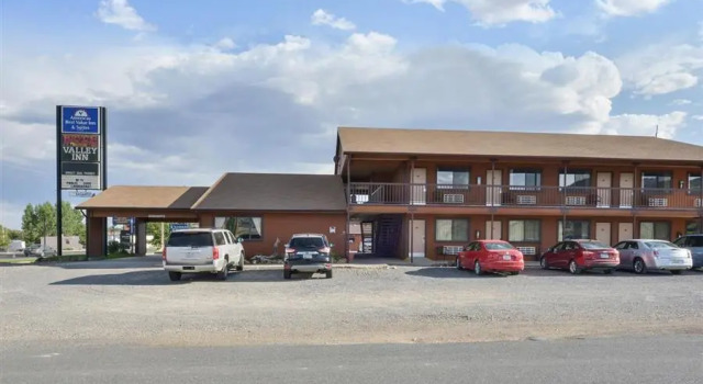 Кровать в общем номере Red Ledges Inn