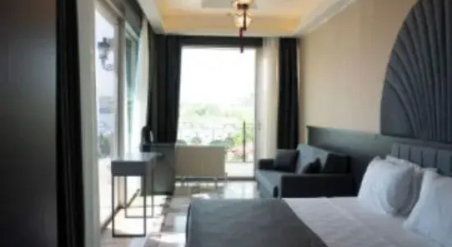 Номер Deluxe Kronos Hotel