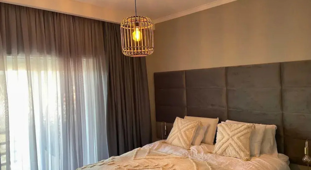 Номер Comfort Sunset View KING Bedroom