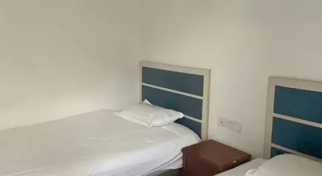 Кровать в общем номере Nanchang Jushe Boutique Hotel (Qifeng Road Subway Station Branch)