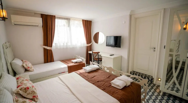 Трёхместный семейный номер Standard Cunda Pusula by Megaron Homes