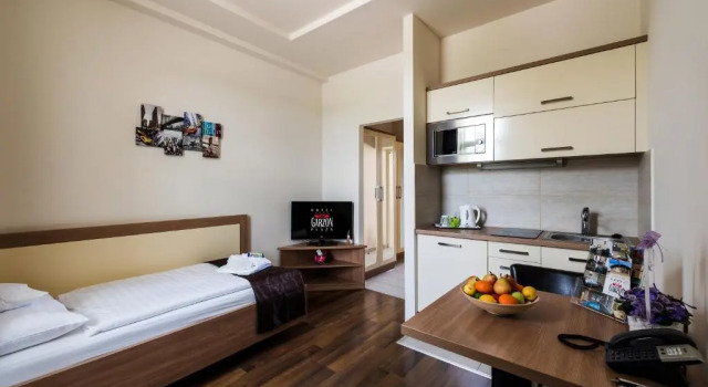 Апартаменты Hotel Garzon Plaza