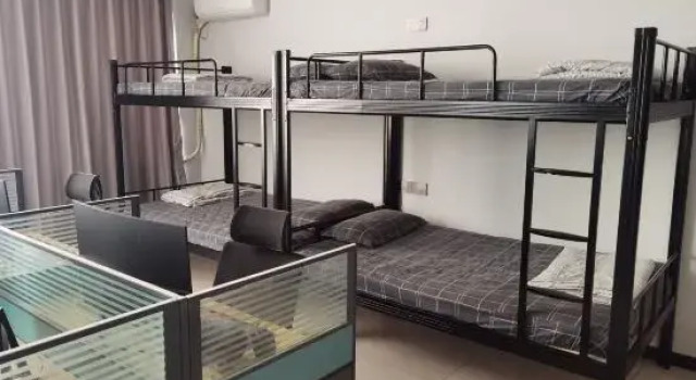 Кровать в общем номере Xinchen E-Sports Hotel