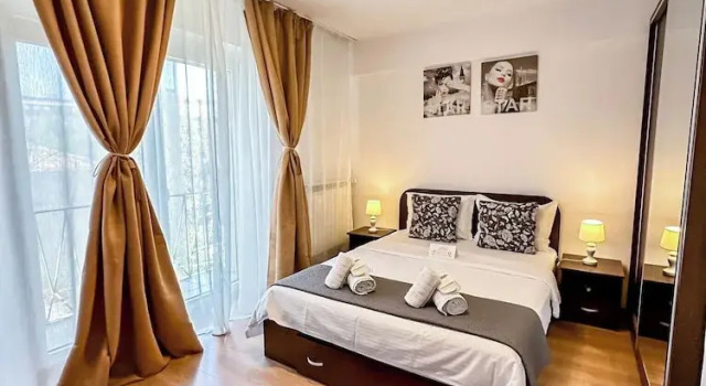 Семейные апартаменты с балконом и с видом на город Sunrise Apartments City Center
